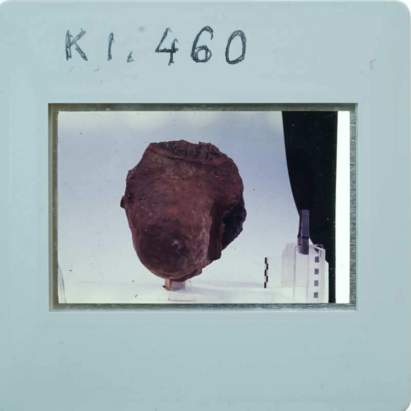 Terracotta breast fragment from front K1.460.