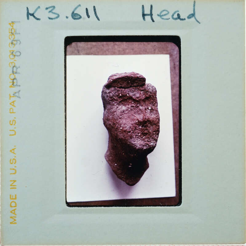 Detail of terracotta figurine head.