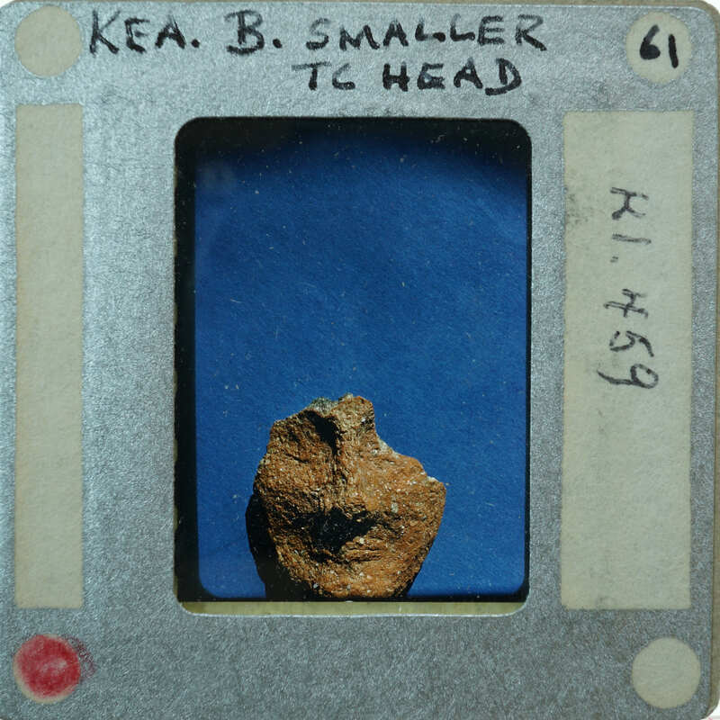 Fragment of terracotta face showing lower half K1.459.