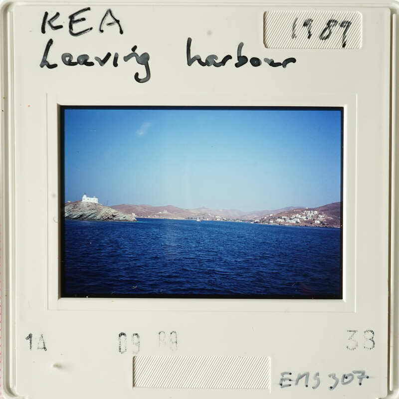 A photograph of an ocean view with islands and clear skies.