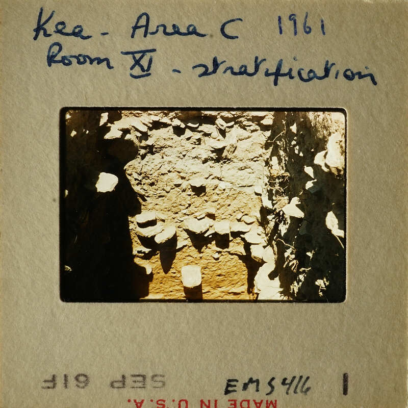 Old photograph with annotations on its border, featuring an ancient structure.