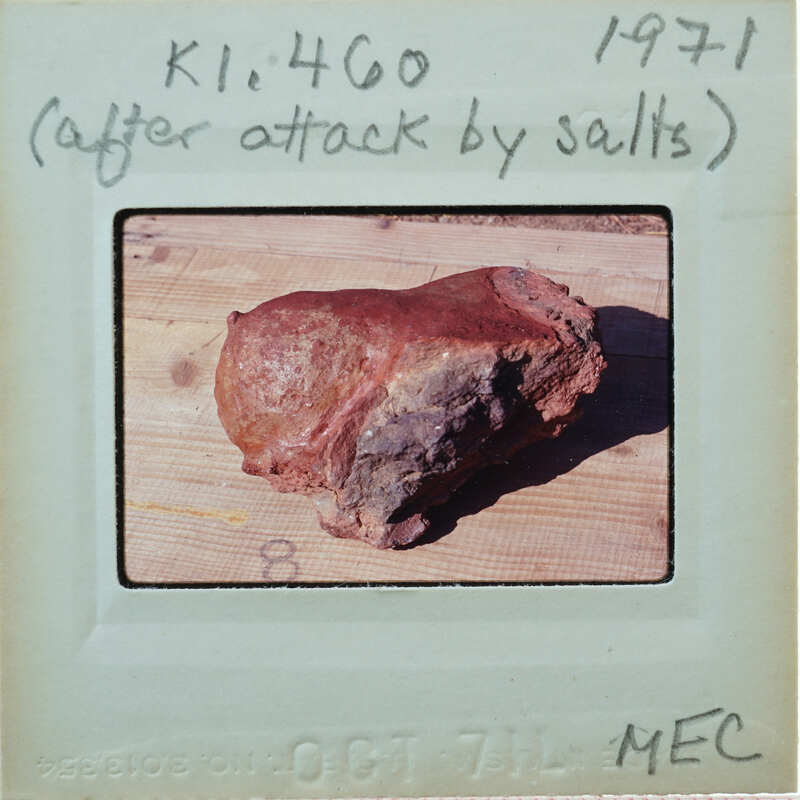 Terracotta breast fragment lying on table K1.460.