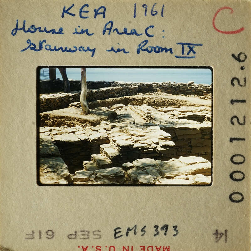 Ancient ruins with stone steps and walls, possibly from an archaeological site.