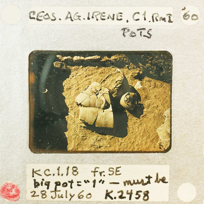 Black and white photograph of an archaeological site with a pottery shard, taken on July 29th, 1960.