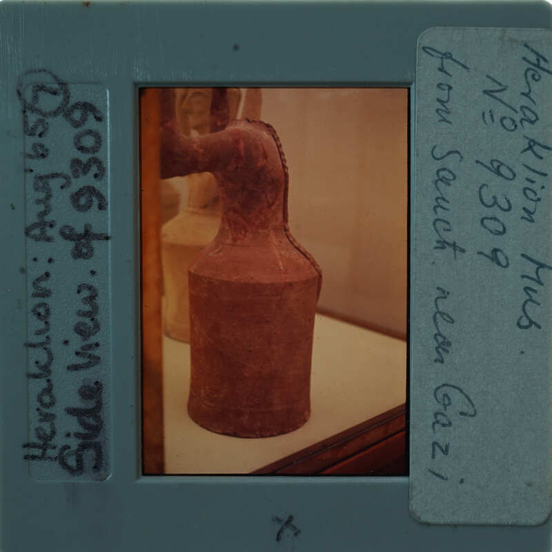 An ancient clay figurine on display.