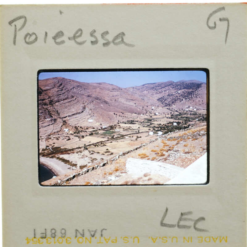 A slide showing a scenic view of mountains and fields with handwritten notes on the border.