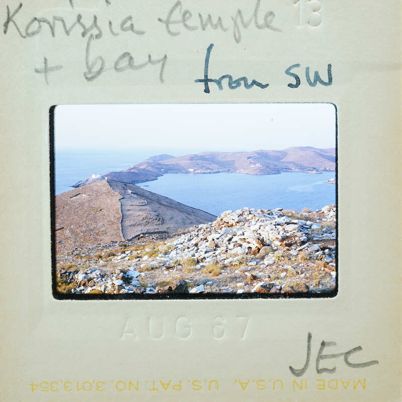 Picture of a scenic landscape with mountains, water, and sky.