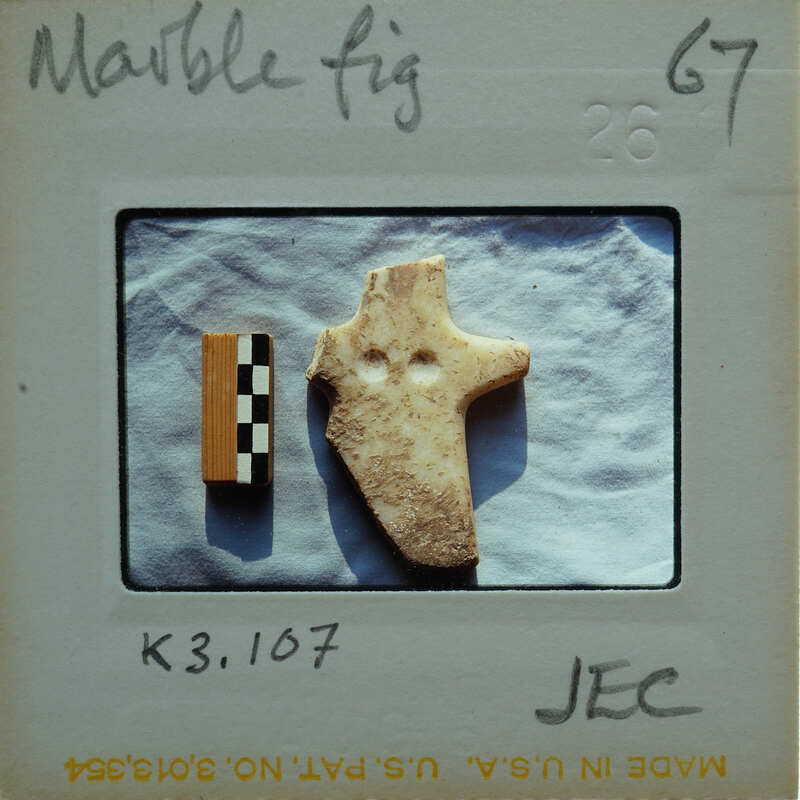 Marble figurine fragment.