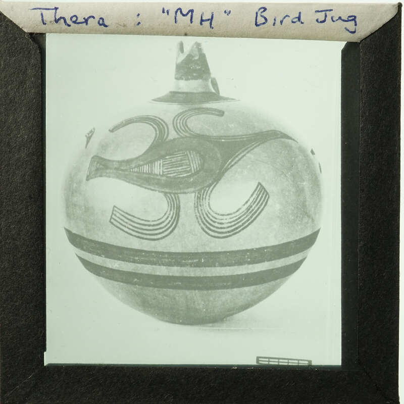 Old photograph of a vase with intricate designs, displayed in a frame.