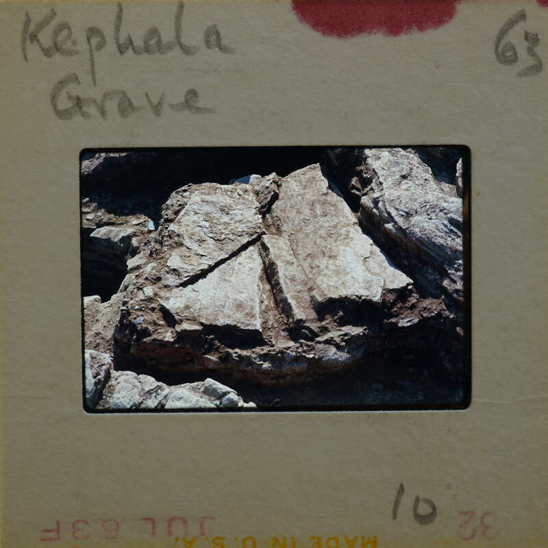 Rocky cliff with jagged edges and a rugged texture.