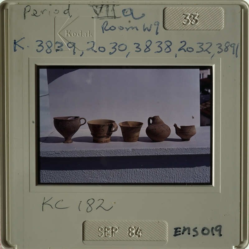 Row of ancient vases on display.