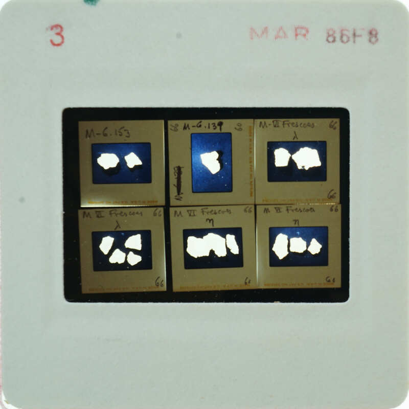 A slide of multiple slides of painted wall plaster fragments
