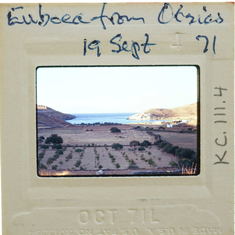 Slide of a coastal landscape with mountains and fields, dated September 1971.