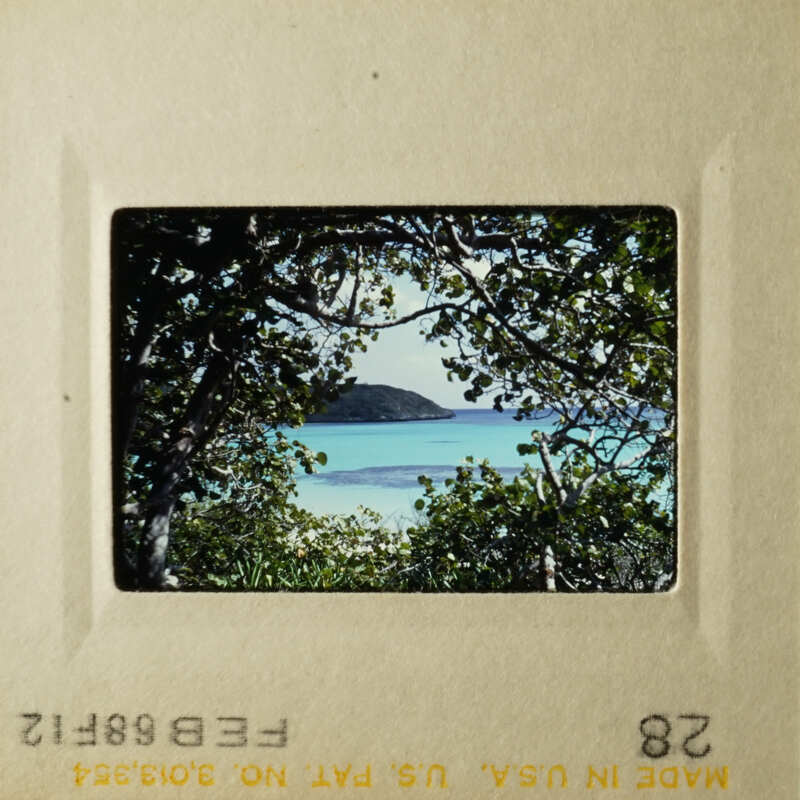 Two pictures of tropical beach scenes with clear blue water and palm trees, taken from different angles.