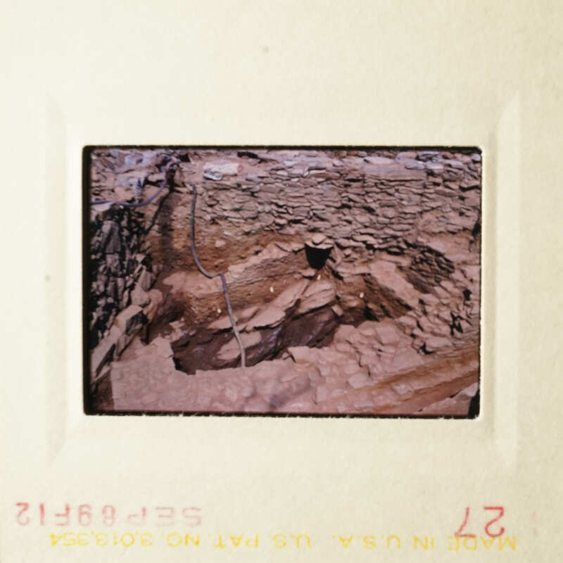 This photo shows an underground cave with various formations and rock structures.