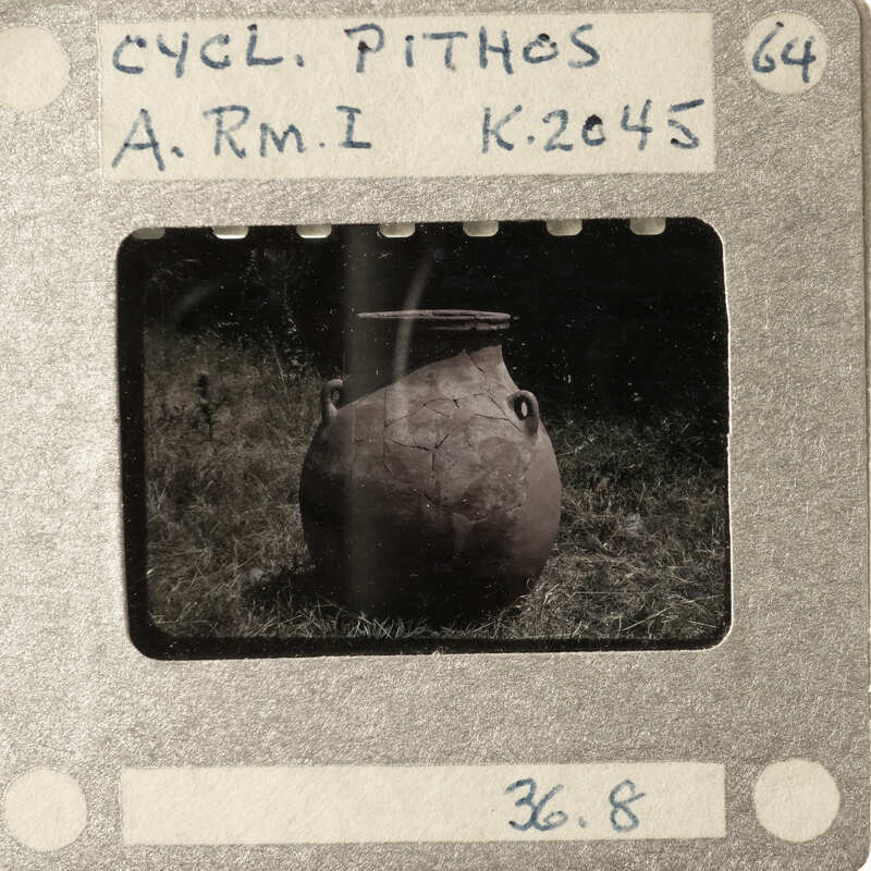 Old photograph of a clay pot with film strip details.