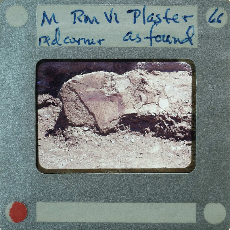 A vintage film strip with a label and an image of a rock formation.