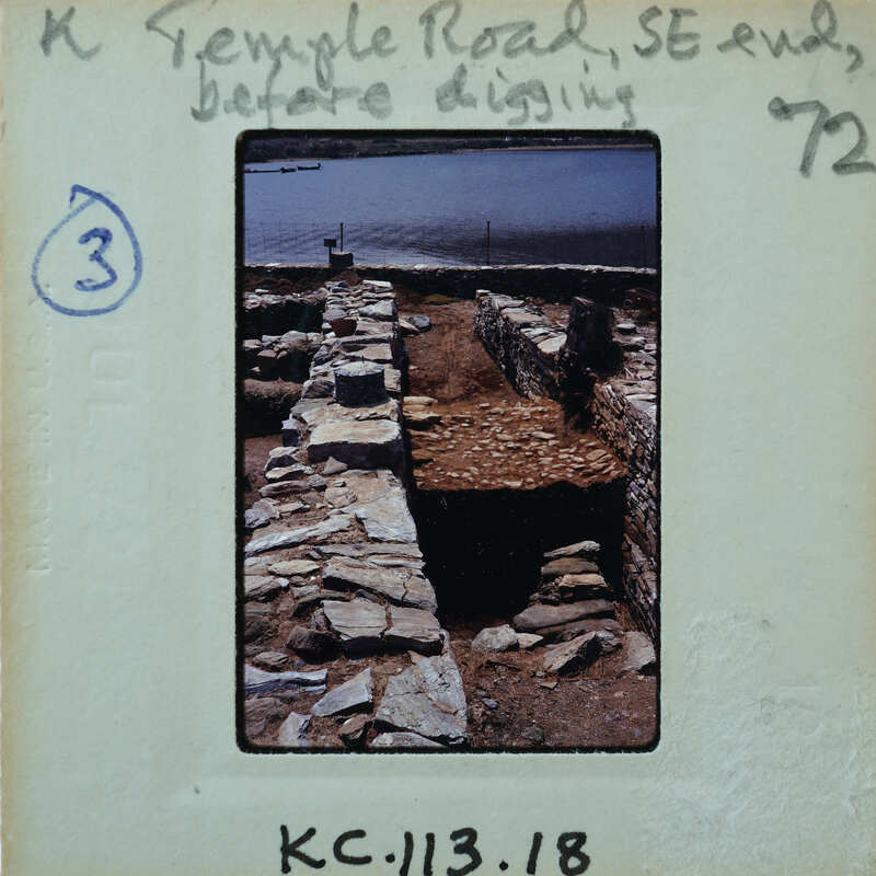 Parallel stone walls with surface between them.