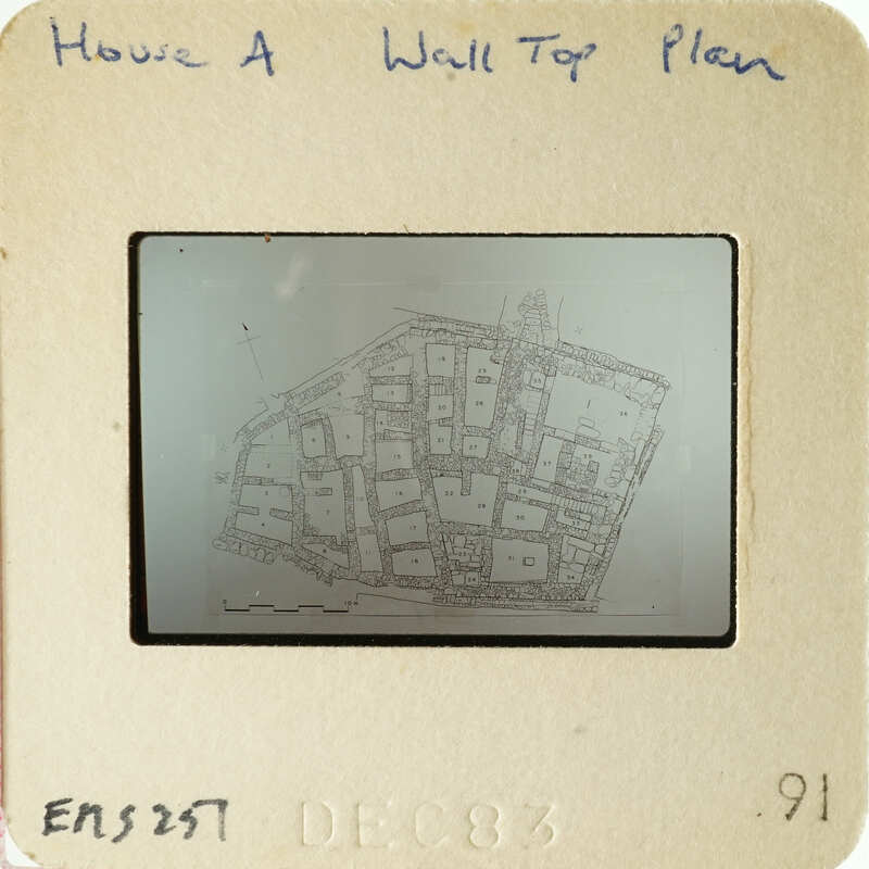 Aerial view of a building complex on an old photograph.