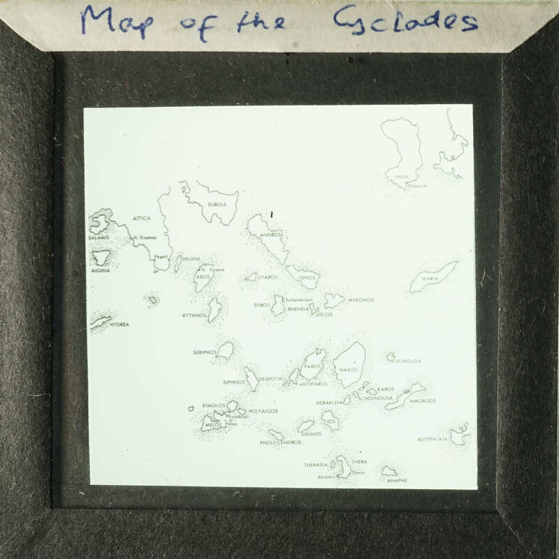 A map of the Galapagos Islands displayed on an antique slide.