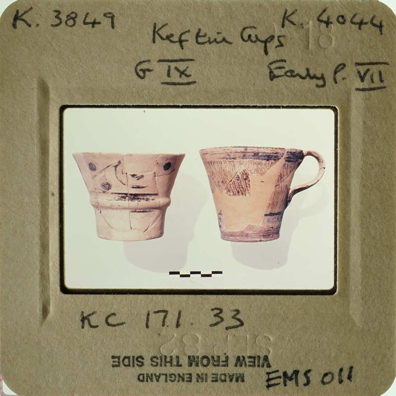 Two clay pots on display.