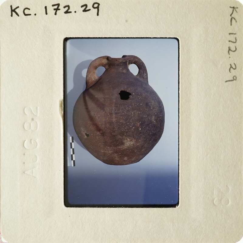 Ancient pottery artifact on display.