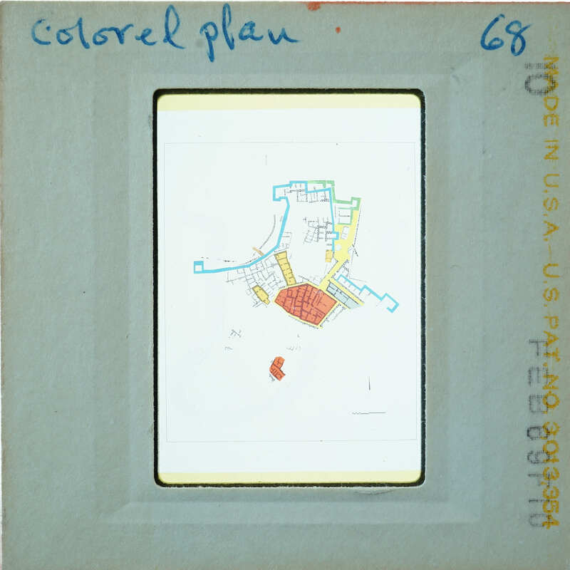 Photo of slide of site plan with various areas colorized.