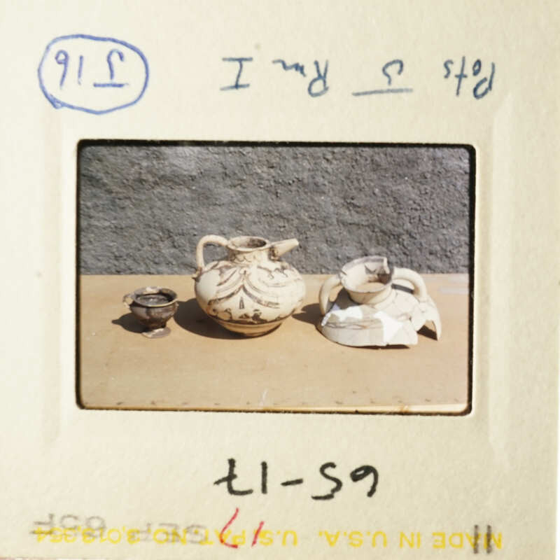 Two pictures of pottery displayed on a table.