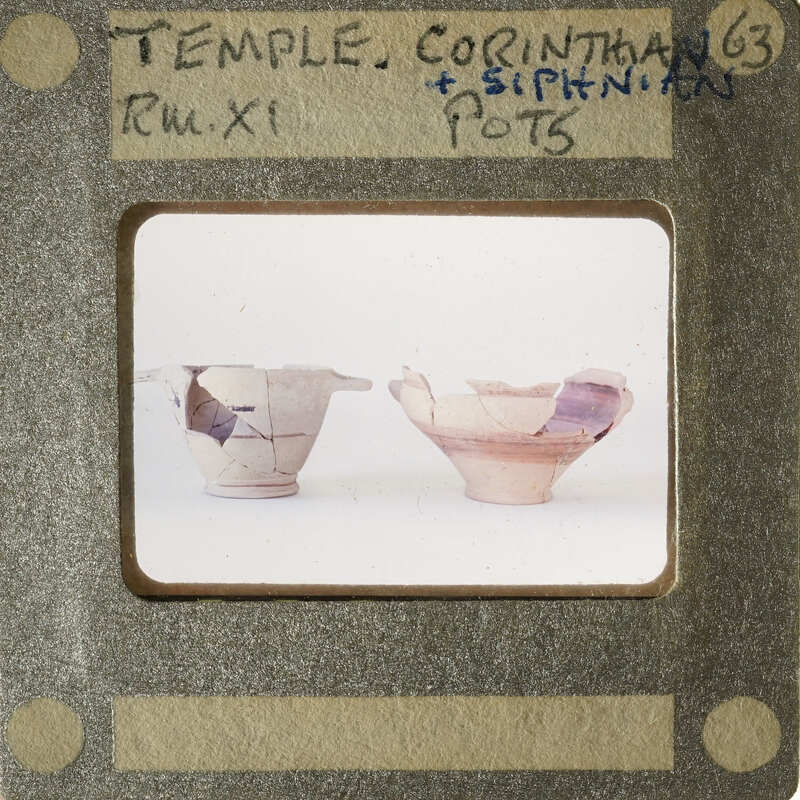 Two clay pots on display.