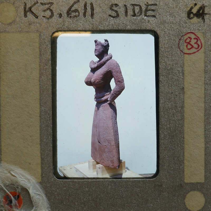 Terracotta figurine K3.611 in profile.