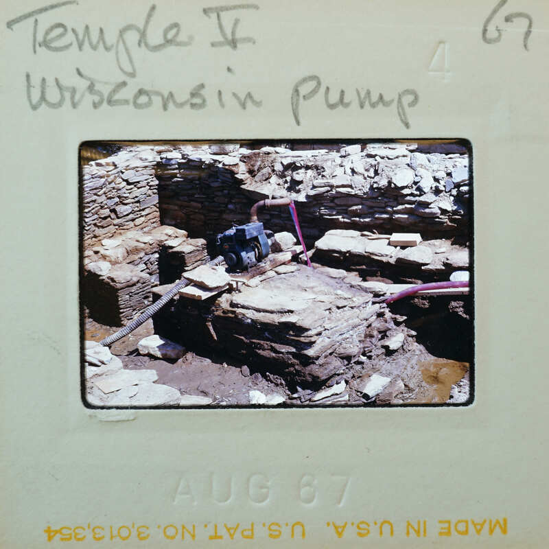 Old photo of a Wisconsin Pump with visible ruins and stones.