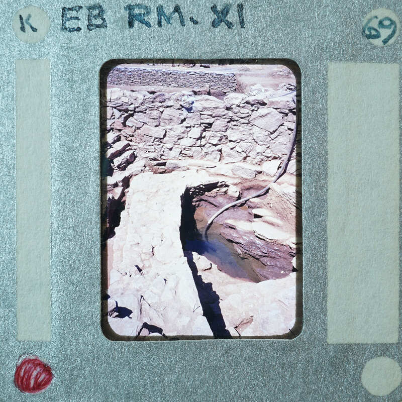 Excavated stone walls and modern drainage system.