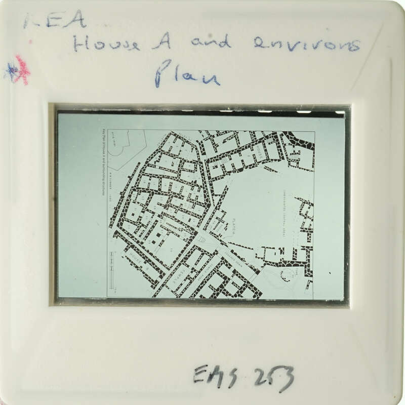 The image shows an old map with handwritten annotations on a white background, possibly a label or cover.