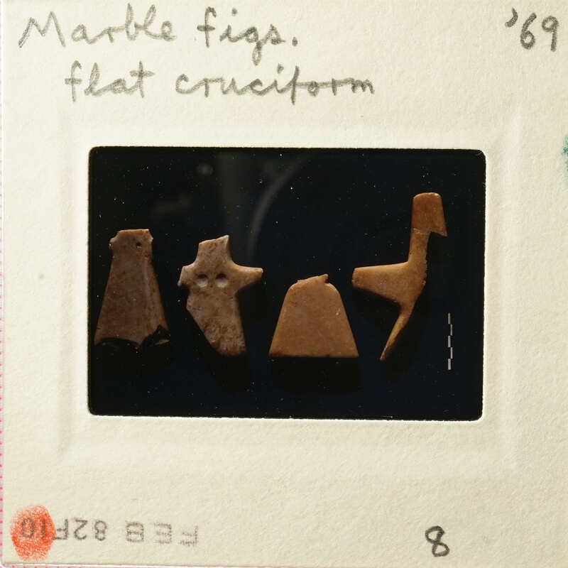 Collection of small figurines on display.