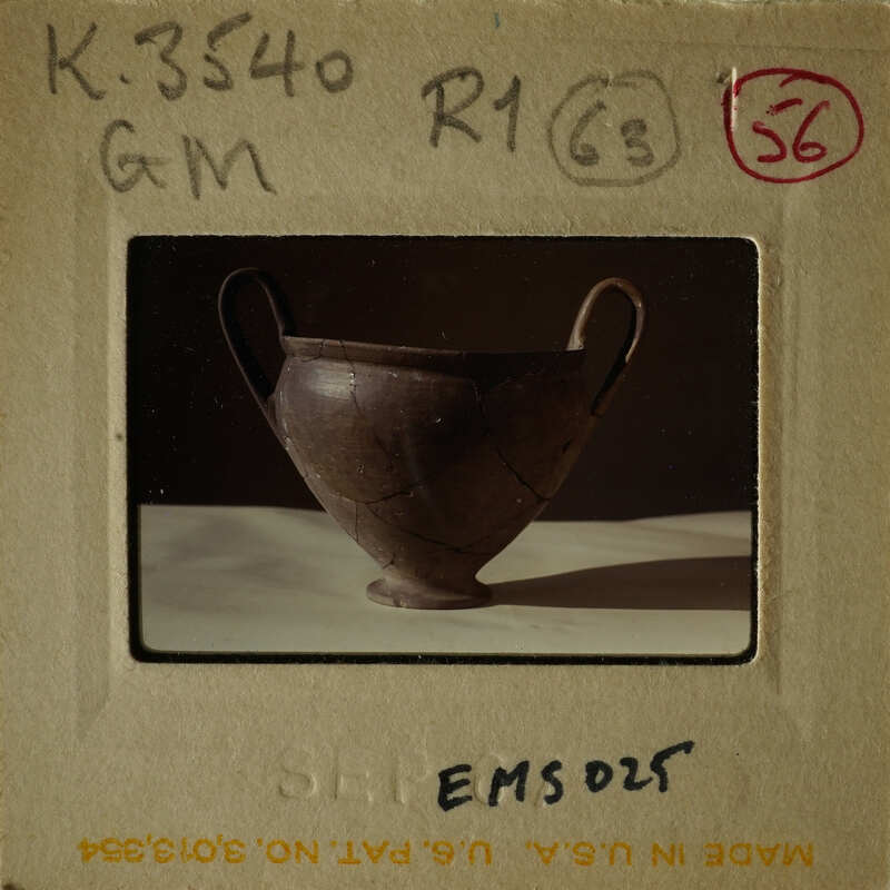 A photograph of an ancient Greek amphora.