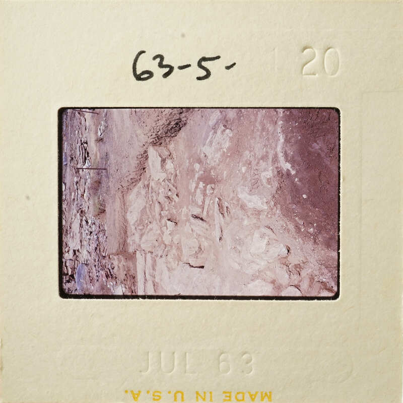 A photograph of an ancient artifact with visible details and textures.