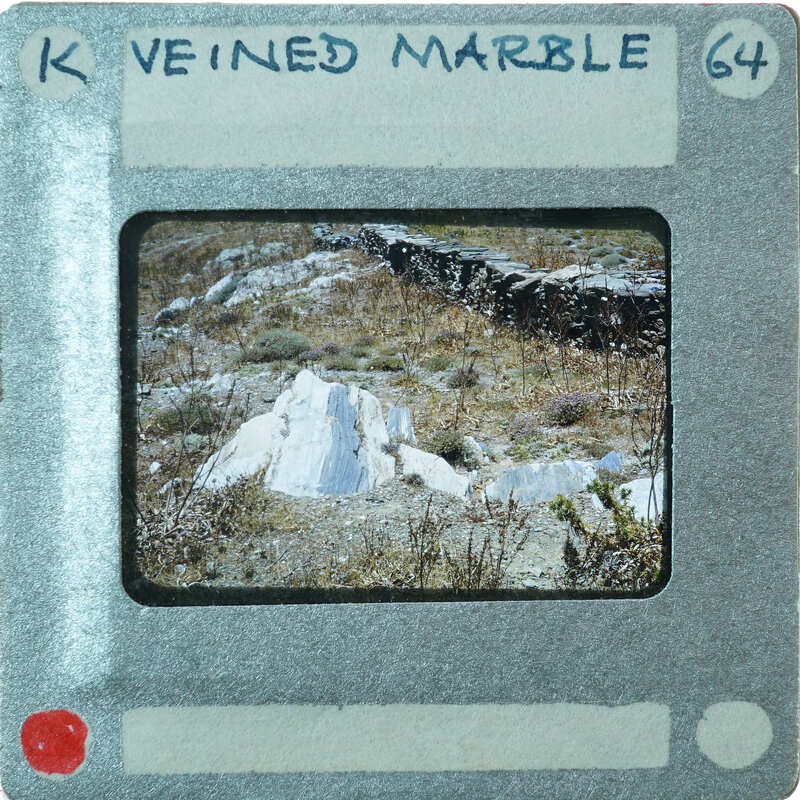 Exposed marble stone coming from the ground.