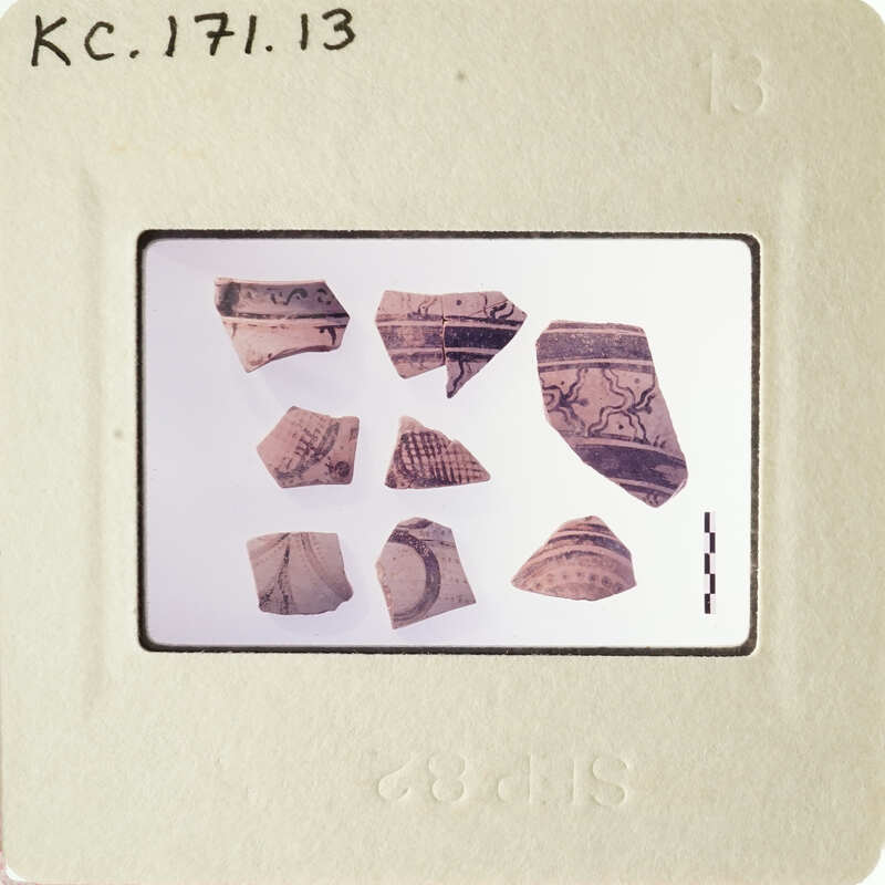 Pieces of pottery on a white background.