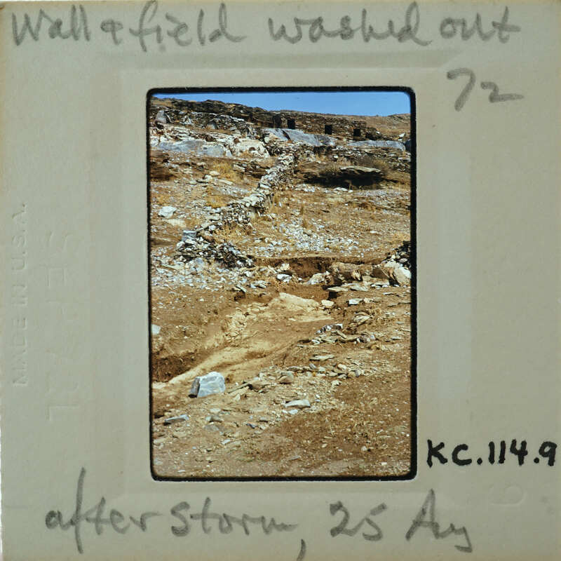 A vintage photo of a rocky landscape with an old wall, possibly from the 1970s.