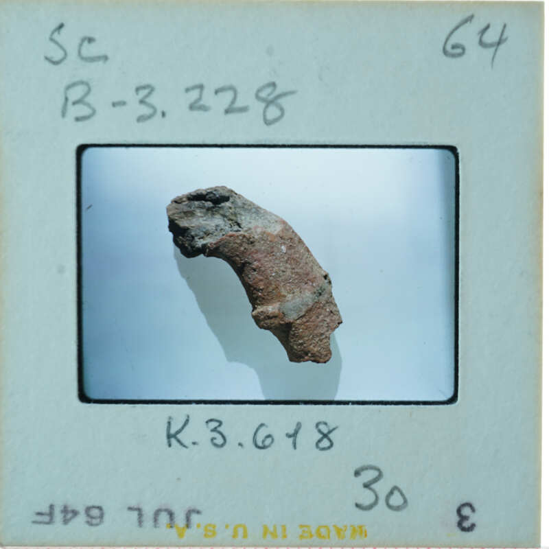 Terracotta figurine arm fragment.