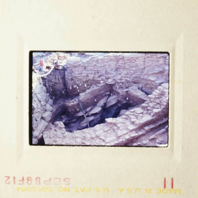 This is an image of a destroyed building, possibly from a natural disaster, captured in color.