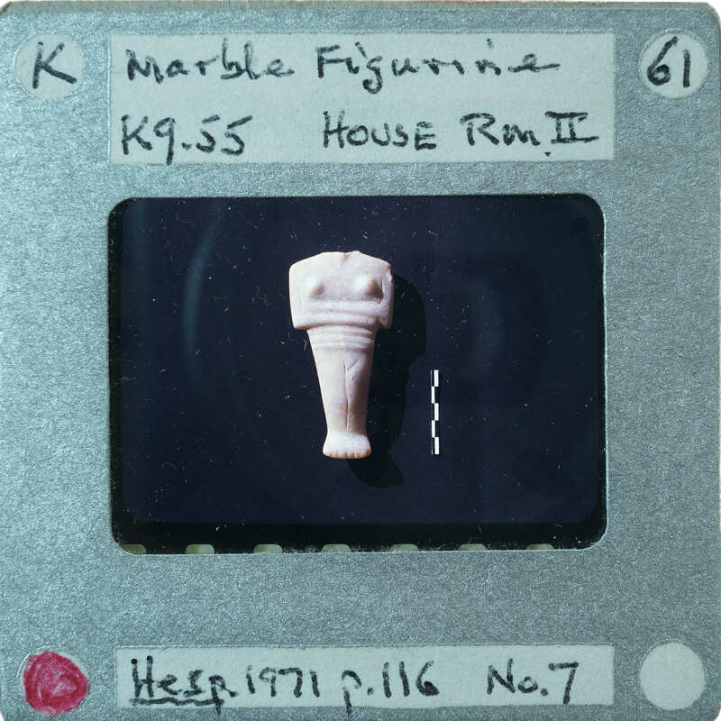 Headless marble figurine on black background K9.55.