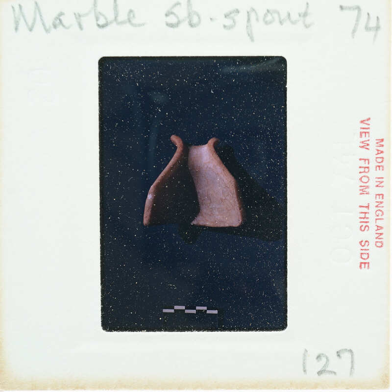 Fragment of stone vase showing spout.