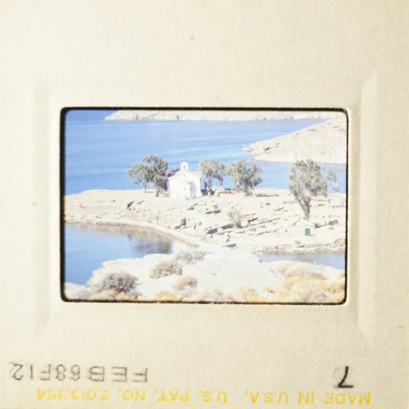 The image shows two pictures, one depicting a serene lake and the other a quaint village by the water.