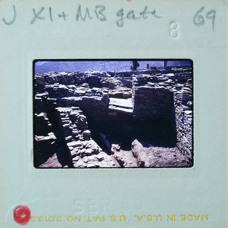 Excavated stone walls in various directions.