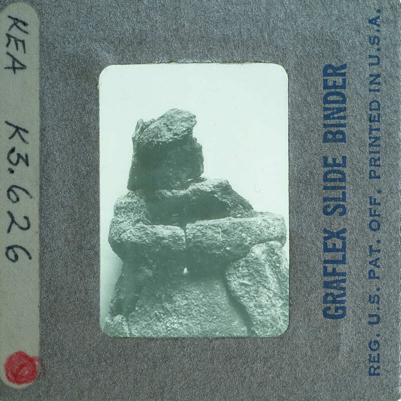 A photograph of a sculpture on a film strip.