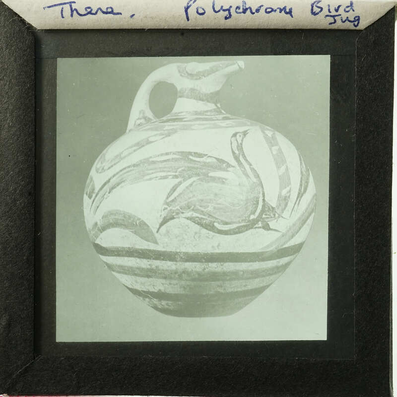 A black and white photograph of an ancient Greek vase with sea creatures depicted on its side.