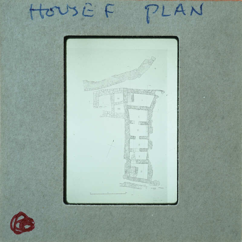 A black and white image of a house plan with handwritten notes on the border.