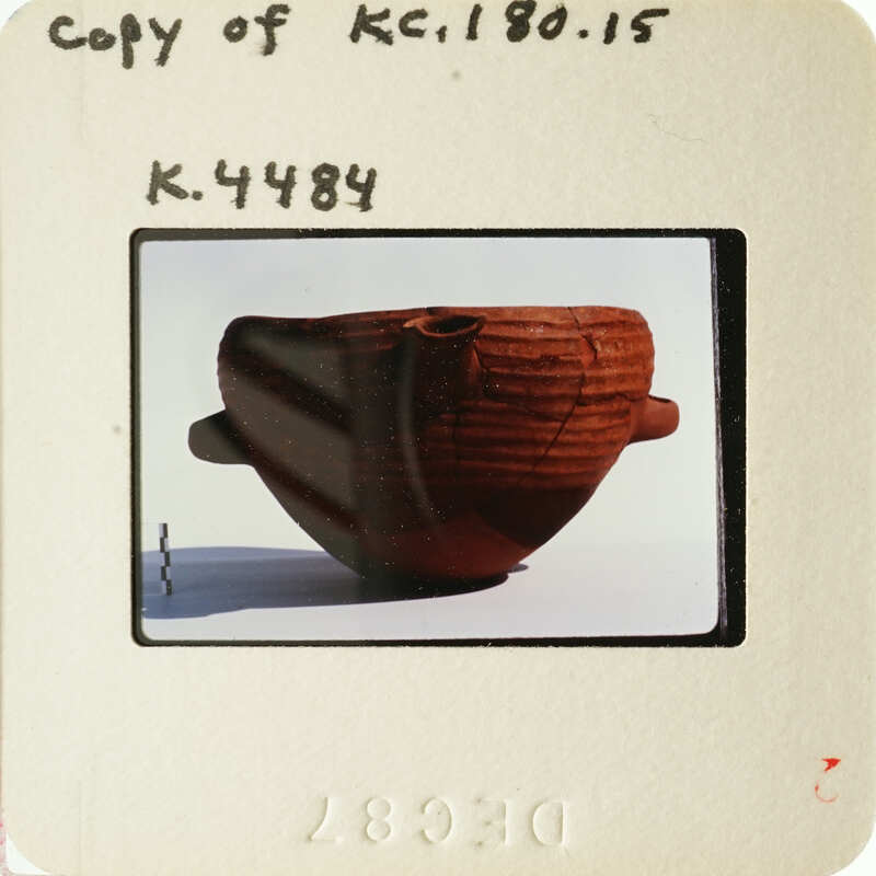 Ancient pottery on display, possibly from an archaeological site.