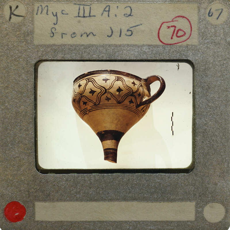 Reassembled stem cup with decorations showing handle but missing base.